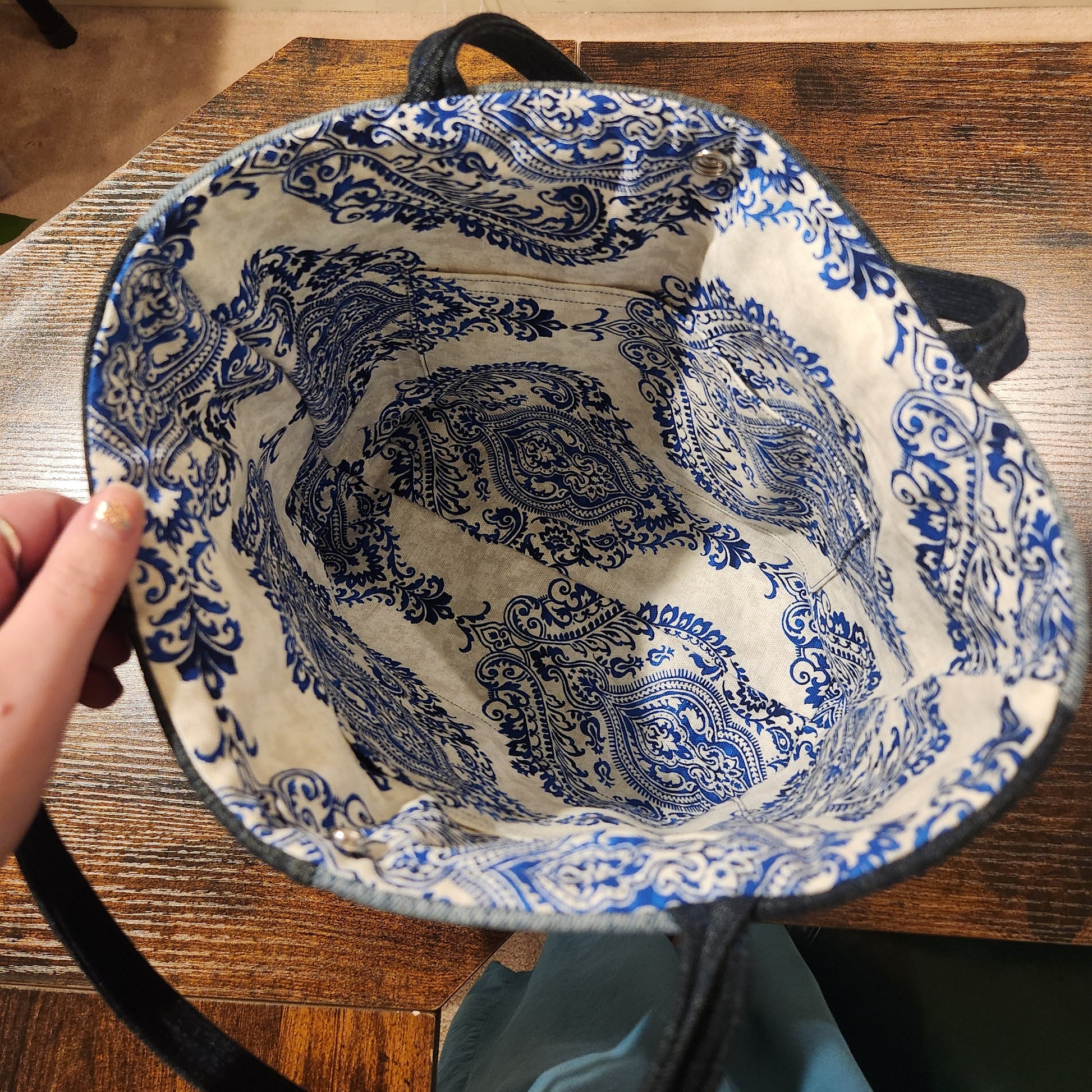 blue and white patterned interior of tote bag