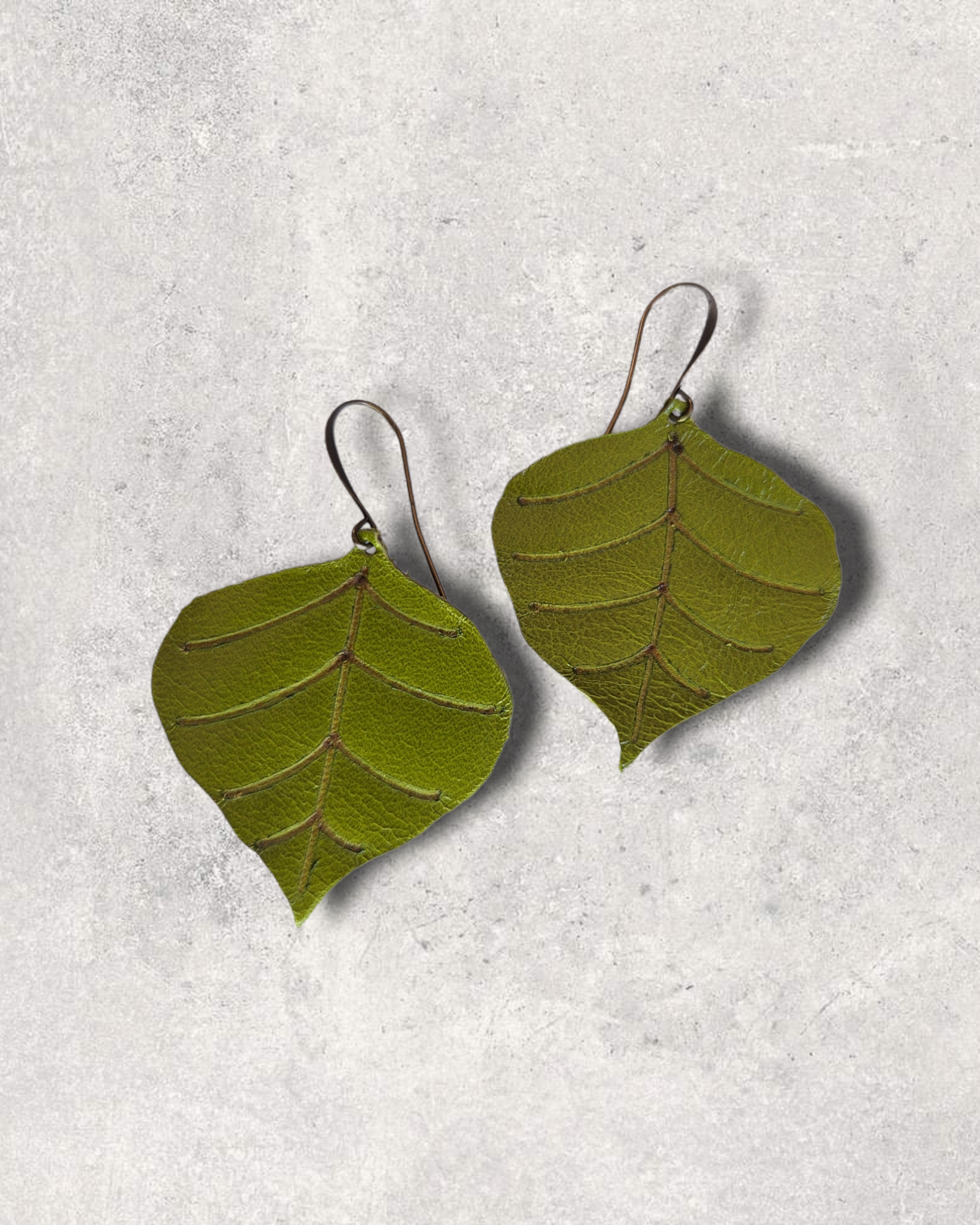 Green Leaf Leather Earrings on white background